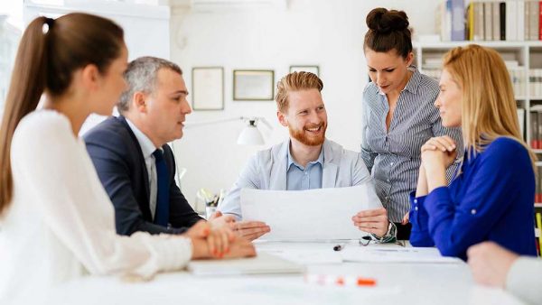 Education Institute professional in a group meeting